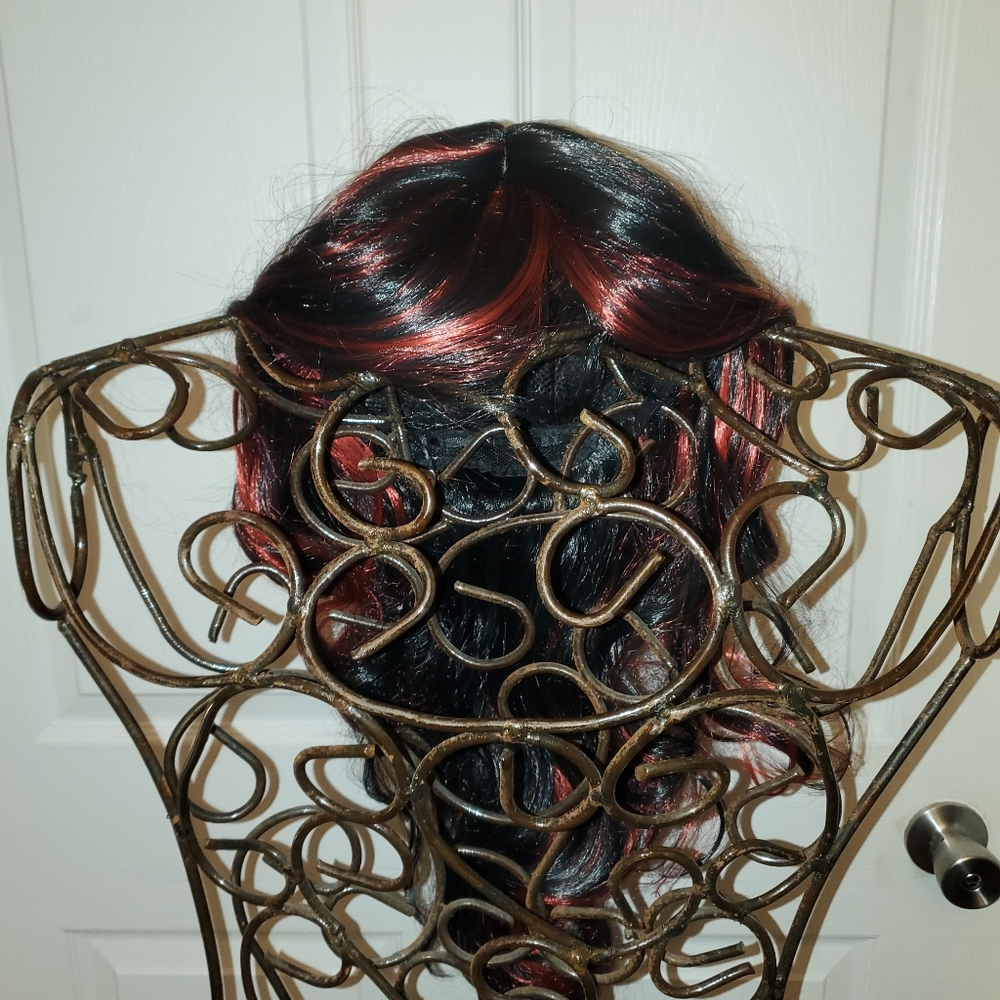 BRAND NEW NEVER WORN!  Black and red wig.
